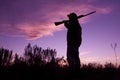 Hunter With Shotgun in Sunset