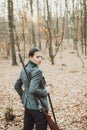 Hunter woman hunting. Hunting in autumn forest. Portrait of beauty woman Hunter. Hunting season.