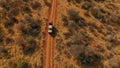 Hunters on an off-road car during a safari.