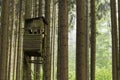 Hunting or birdwatching tower in the woods Royalty Free Stock Photo