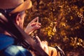 Hunting cartridge. Vintage Texas ranger with cartridge. Man is charging a hunting rifle. Hunter with shotgun gun on hunt