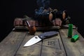 Hunting concept. Smoking cradle and knife. Hunter items