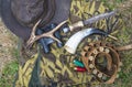 Hunting equipments: deer atler, hunting horn, hat, cartridges.