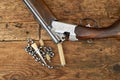 Hunting gun with cleaning kit on a table Royalty Free Stock Photo