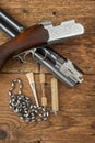 Hunting gun with cleaning kit on a table Royalty Free Stock Photo