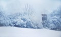 Hunting Hide. Winter in Central Europe. Snowfall. Royalty Free Stock Photo