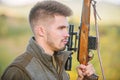 Hunting masculine hobby concept. Man brutal gamekeeper nature background. Regulation of hunting. Hunter hold rifle Royalty Free Stock Photo