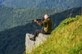 Hunting masculine hobby concept. Regulation of hunting. Focused on target. Hunter hold rifle. Hunter spend leisure