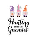 Hunting with my gnomies calligraphy hand lettering with cute gnomes holding eggs. Funny Easter quote typography poster. Vector