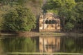 Hunting palace with reflection in rajbagh lake water a heritage and old architecture place hunt playground of wild animals birds