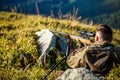 Hunting period. Male with a gun. Close up. Hunter with hunting gun and hunting form to hunt. Hunter is aiming. Shooter Royalty Free Stock Photo