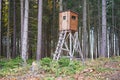 Hunting pulpit or hunters tower in the forest in autumn. Royalty Free Stock Photo