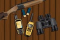 Hunting rifle, cartridges, navigator, walkie-talkie Royalty Free Stock Photo