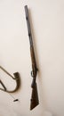 Hunting rifle and horn in a rich ataman house. 19 century