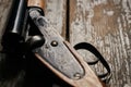 Hunting shotgun riffle on old rustic wooden table Royalty Free Stock Photo