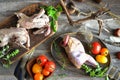 Hunting trophies: raw partridge and woodcock, rustic cuisine