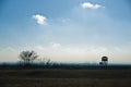 Hunting watchtower on a meadow at sunny autumn day, Deliblatska pescara