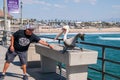 Man feeding Pelican on Huntington Beach Pier
