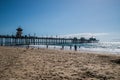 Huntington Beach, California - October 11, 2018: The Huntington Beach Pier as seen on a sunny day from a beach view looking up