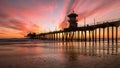 Huntington Beach Pier during a red and orange sunset Royalty Free Stock Photo