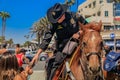 Equestrian police officers from Huntington Beach and Santa Ana Police Departments in front of the Huntington Beach Pier