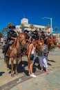 Equestrian police officers from Huntington Beach and Santa Ana Police Departments in front of the Huntington Beach Pier