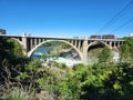 Huntington Park and Monroe Street Bridge at Lower Spokane Falls in Spokane, WA. Royalty Free Stock Photo