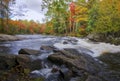 The river rapid in a public park with autumn leaf color Royalty Free Stock Photo