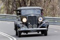 1933 Hupmobile K Sedan driving on country road