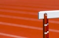 Hurdle on the red running track prepared for competition. Individual sport concept