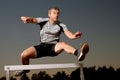 Hurdling in track and field Royalty Free Stock Photo