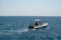 Hurghada, Egypt - August 29, 2021: Cruise boat with an internal combustion engine in the Red Sea. Dinghy excursion tourist