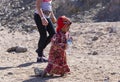 Bedouin children entertain tourists. Kids of the Sahara desert.