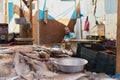 HURGHADA, EGYPT - FEBRUARY 19, 2022: Local fish seller sitting in the market. Fresh caught fishes at fish market