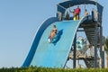 Hurghada, Egypt. November 19 2018 People in the water park go down from the water slide