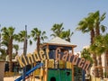 Hurghada, Egypt- September 22, 2021: Children`s playground with slides and attractions on site. Copy space