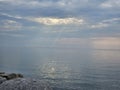 Huron Lake Sunset Goderich beach stones clear water evening Ontario Canada landscape Royalty Free Stock Photo