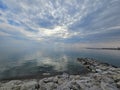 Huron Lake Sunset Goderich beach stones clear water evening Ontario Canada landscape Royalty Free Stock Photo