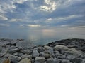 Huron Lake Sunset Goderich beach stones clear water evening Ontario Canada landscape Royalty Free Stock Photo