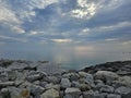 Huron Lake Sunset Goderich beach stones clear water evening Ontario Canada landscape Royalty Free Stock Photo