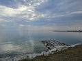 Huron Lake Sunset Goderich beach stones clear water evening Ontario Canada landscape Royalty Free Stock Photo