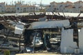 Hurricane Ian destroyed boat station in Florida coastal area. Natural disaster and its consequences