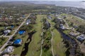 Hurricane Ian destroyed homes in Florida residential area on golf course. Natural disaster and its consequences Royalty Free Stock Photo