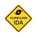Hurricane Ida warning sign. Yellow rhombus icon with black border with hurricane symbol and caption