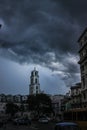 A hurricane is making its way on land in La Havana Cuba, creating a very oppressing scene with frightening lightening Royalty Free Stock Photo