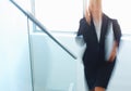 Hurry, stairs and blur of business woman in rush for meeting, working and job in office. Corporate, professional and