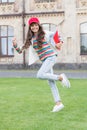 She is in a hurry to lesson. Energetic child holding lesson books. Little cute girl running to private lesson. Today is Royalty Free Stock Photo