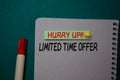 Hurry Up Limited Time Offer write on a sticky note isolated on green background Royalty Free Stock Photo