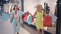 Hurry up on shopping discounts, crazy shopaholics rush to sale in trendy store on black friday