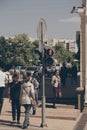 Hurrying people on city street at traffic light on weekdays Royalty Free Stock Photo